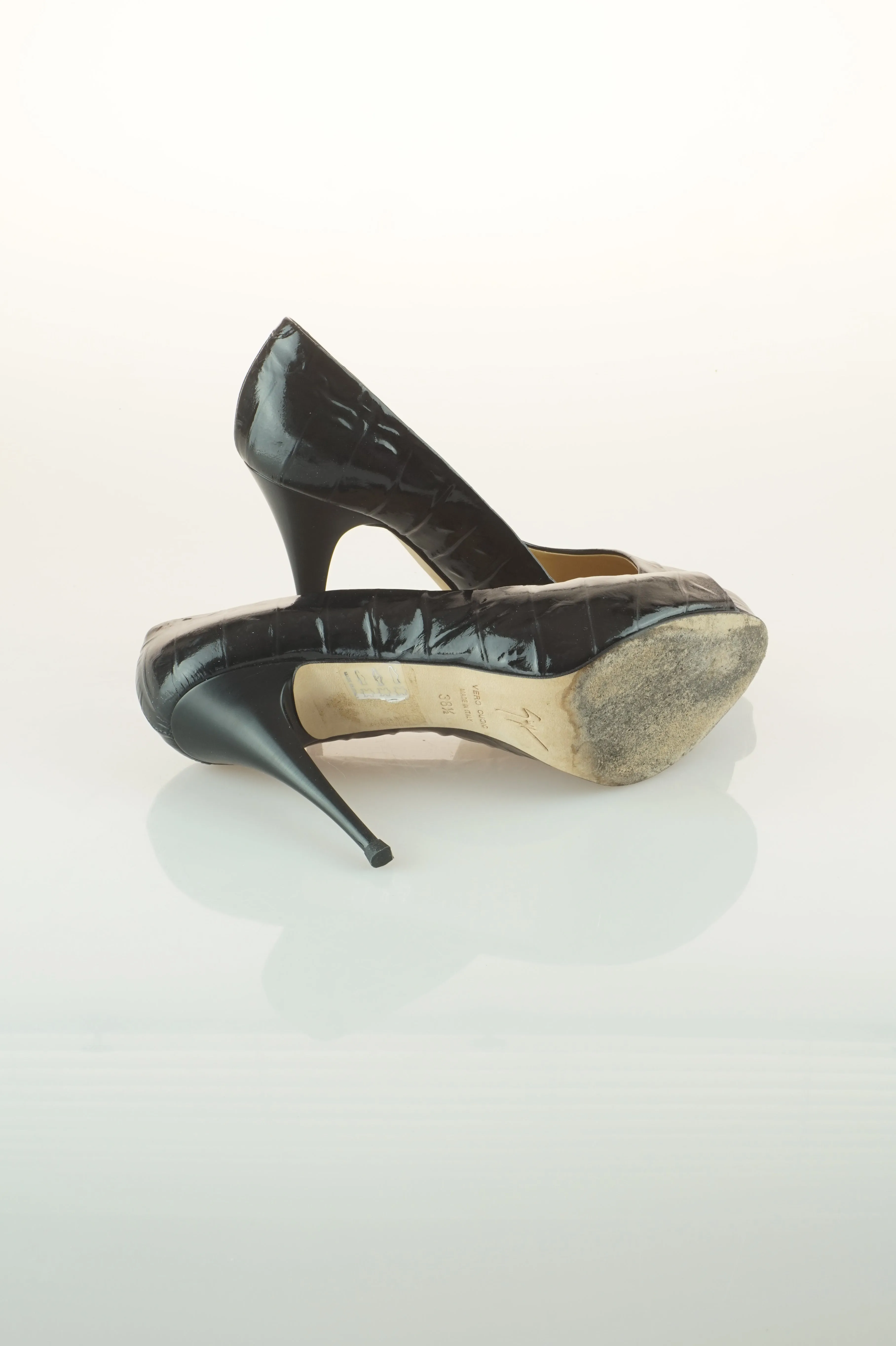 Black patent peep toes