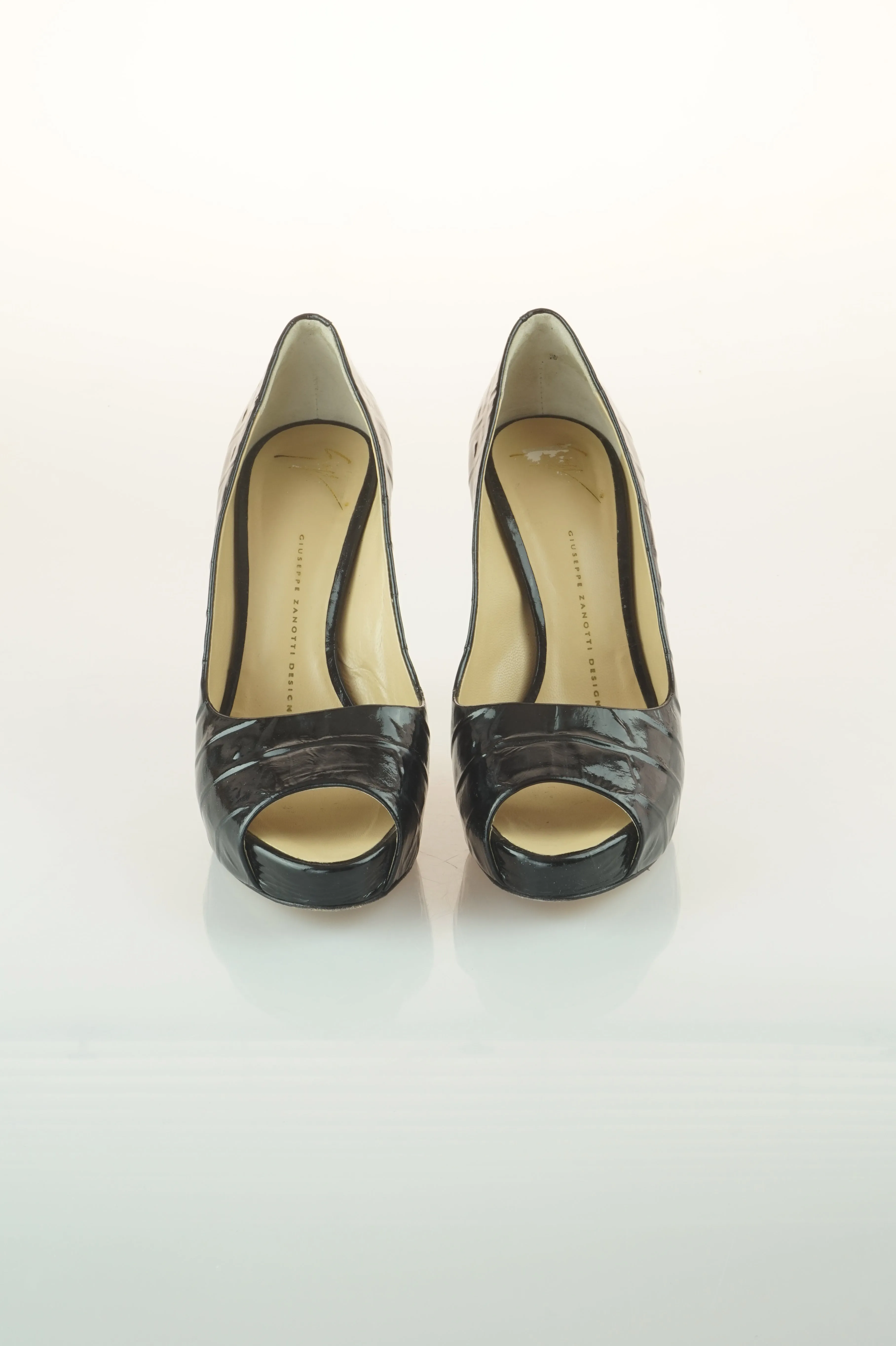 Black patent peep toes
