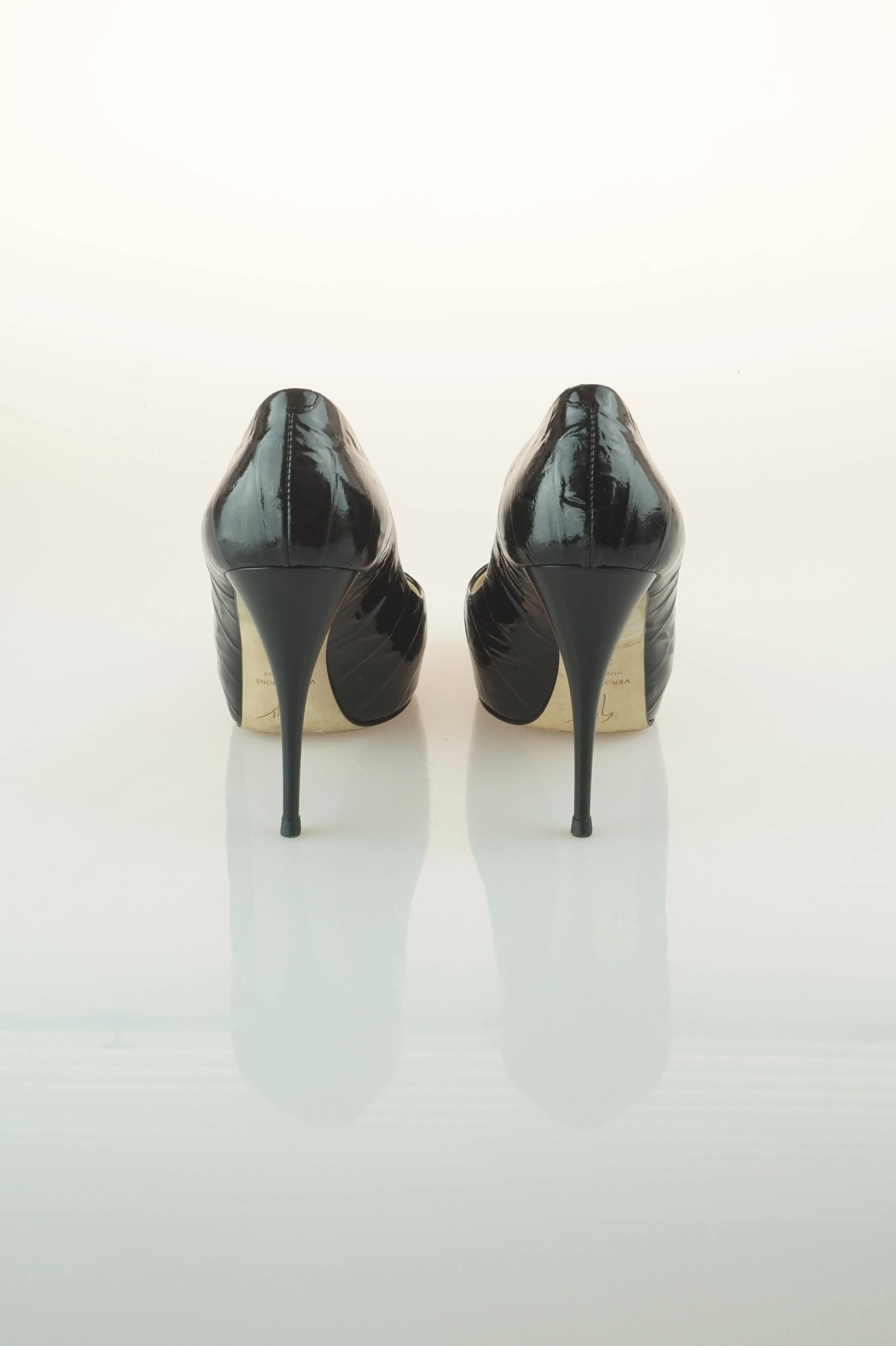Black patent peep toes